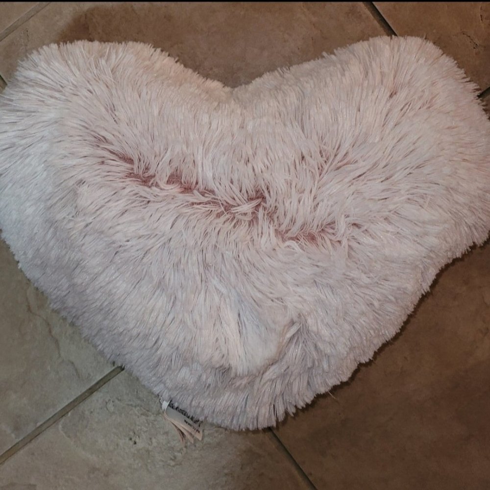 Pink fluffy heart shaped pillow